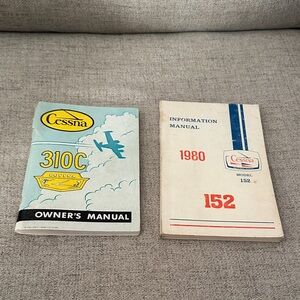 Set of 2 Cessna Owner's and Information Manuals-310C and 152